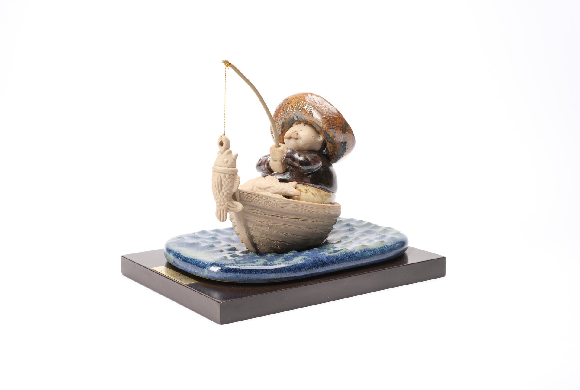 Pescador en Lancha por Rodo Padilla – Talleres Rodo Padilla